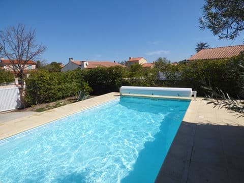 Sunny Heated Pool ready for swimming in March