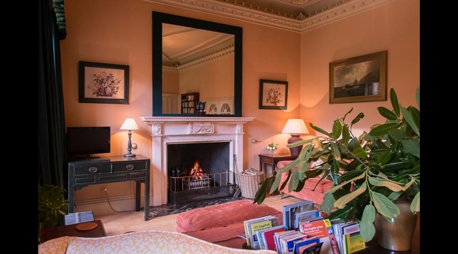 A cheery woodfire in the sitting room.