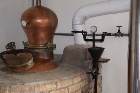 The copper hood and the pressure gauge