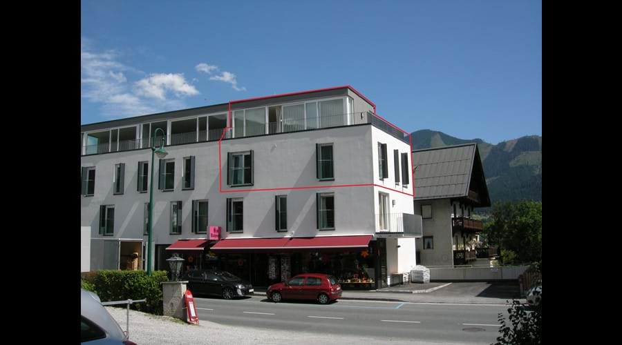 Front of building - apartment outlined in red.  Living area on top floor with amazing views