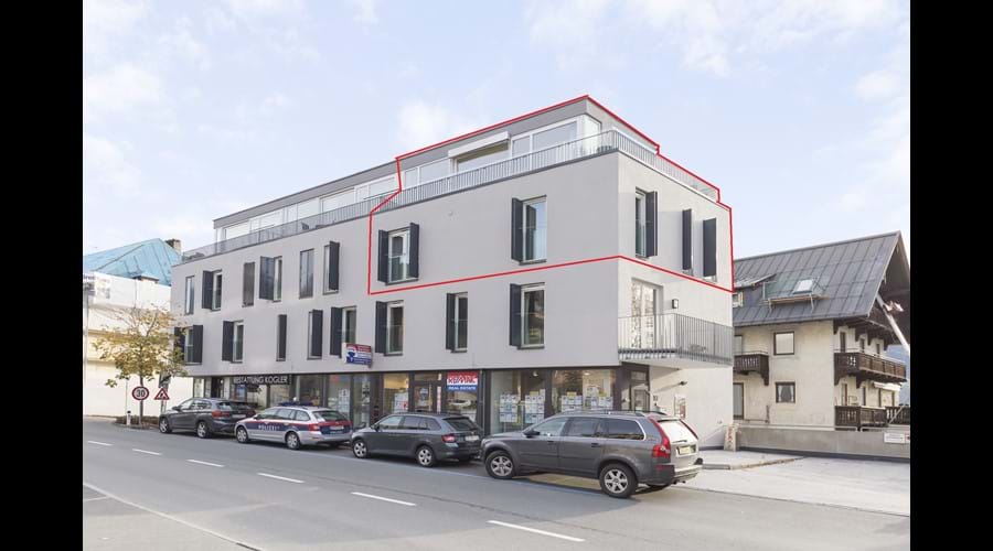 Front of building - apartment outlined in red.  Living area on top floor with amazing views