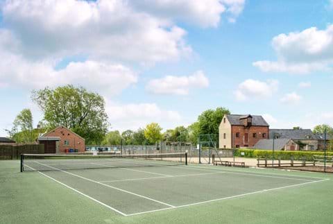 One of the three tennis courts on the estate 