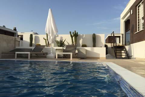 Poolside loungebeds overlooking 10 x 5 m private pool
