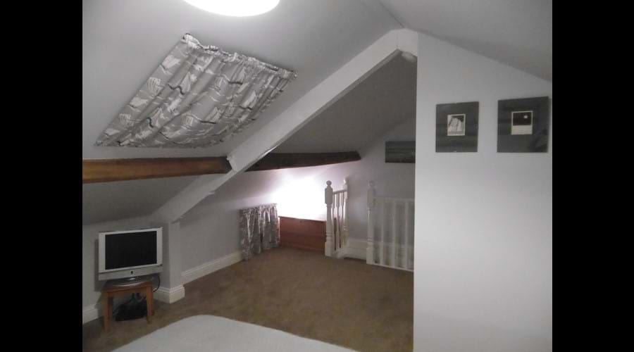 Watch a movie from the King size bed