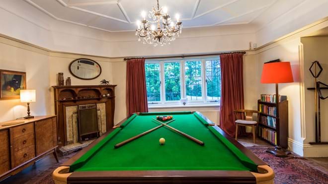 The dining hall – the table hides a full-size pool table