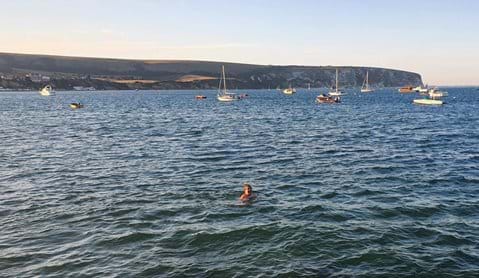 Swimming across Swanage Bay for breakfast