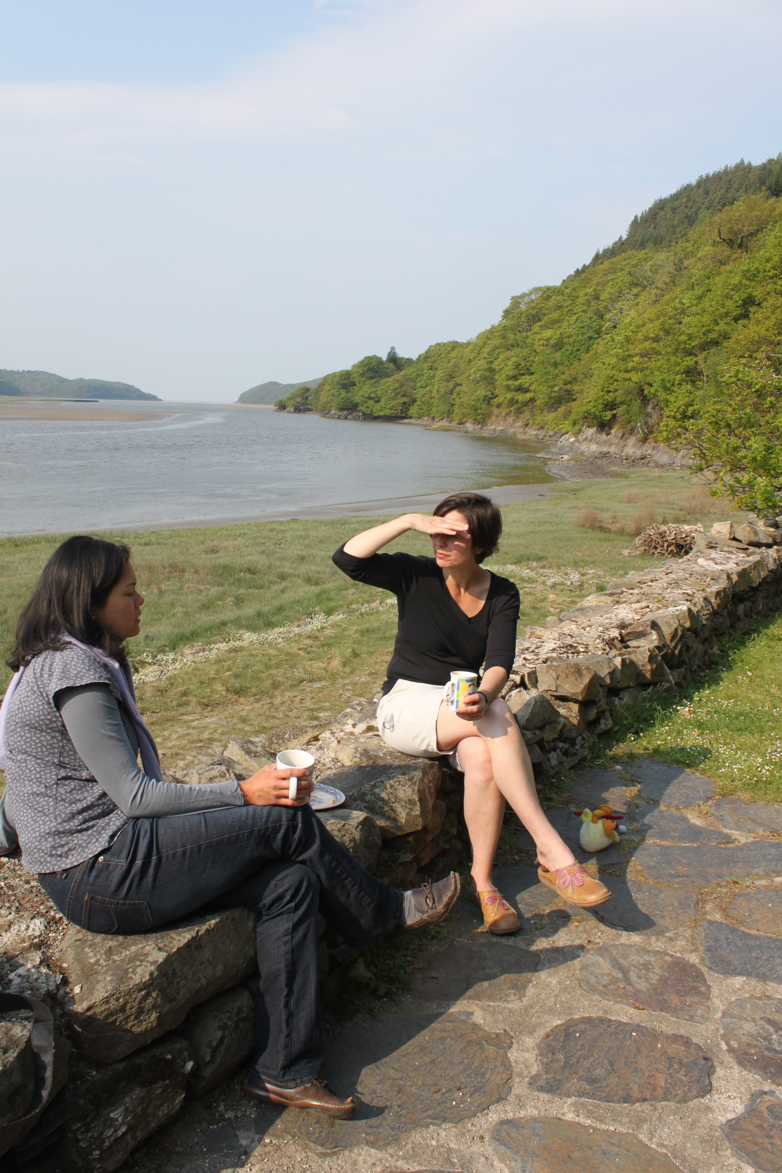 Sitting on the wall outside the cottage