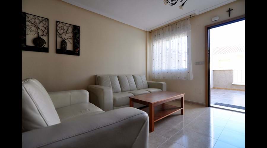 Lounge leading directly out onto the spacious front patio area