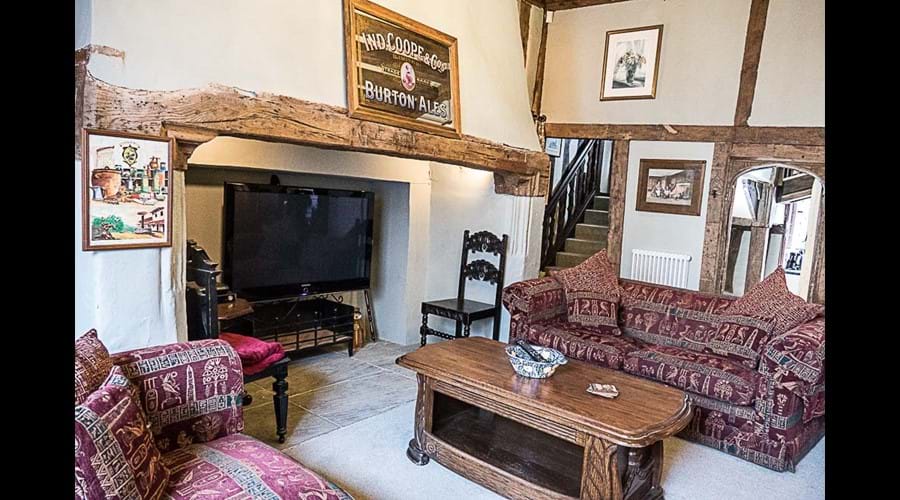 Lounge with 50" TV in fireplace