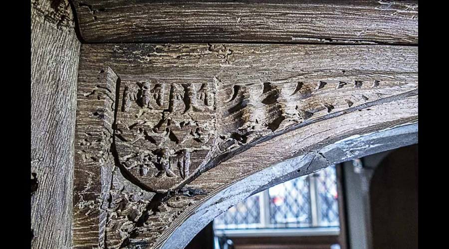 Spandrel with Taylour coat of arms, a tease, dancettes, ermines between three eagl s