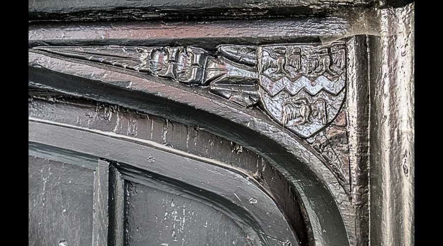 Carved Spandrel on outside of house, three eagles