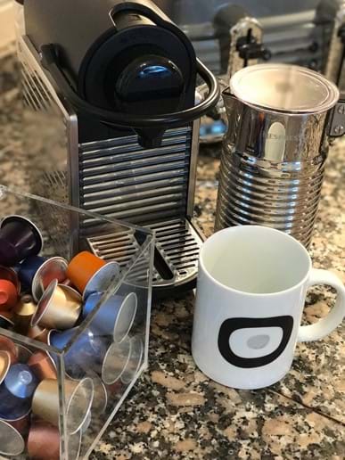 Nespresso, Aeroccino, and coffee mugs
