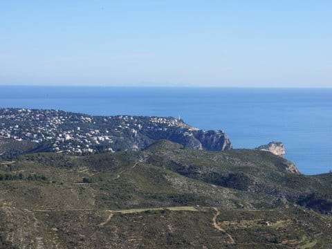 View across Cumbre del Sol to Cabo de la Nao and Ibiza