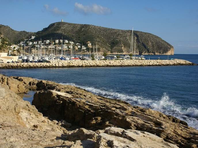 The Moraira sea-front with El Portet and the marina in the background