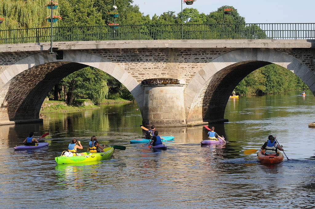 Kayakingunder the bridge at Pont D'Ouilly, Normandy