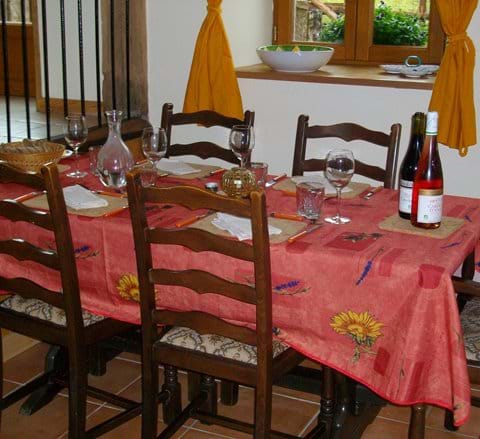 Eco-Gites of Lenault, a self catering gite , sleeps 5 in Normandy, France has a large dining room table