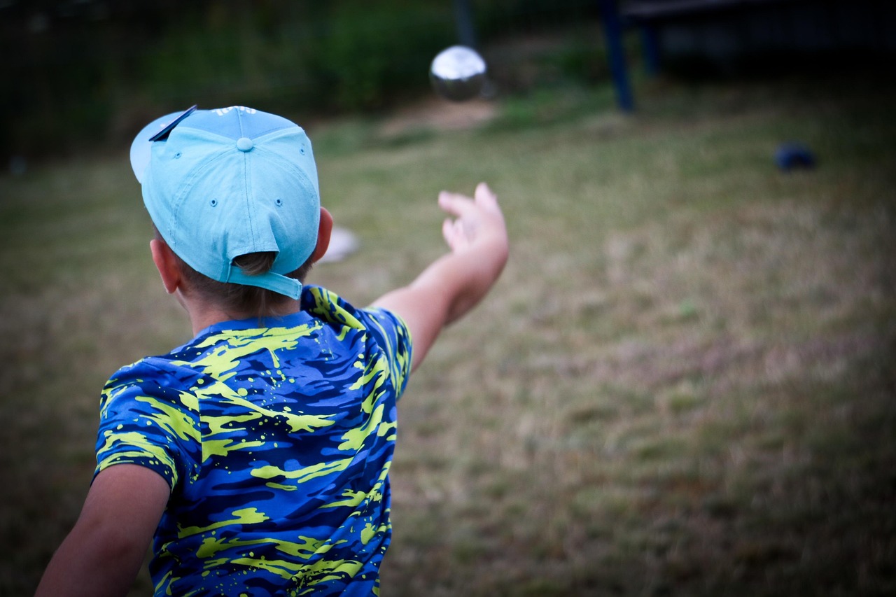 Child playing boules