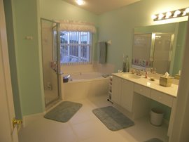 En Suite showing bath and Walk in shower