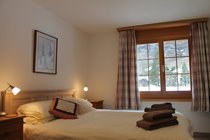 King bedded room with fabulous views of Staubbach Falls