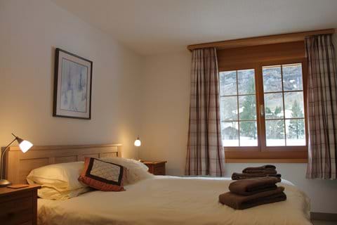 Double bedroom with King bed , overlooking Staubbach Falls