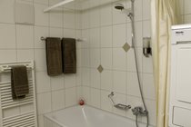 Modern bathroom with washer/drier