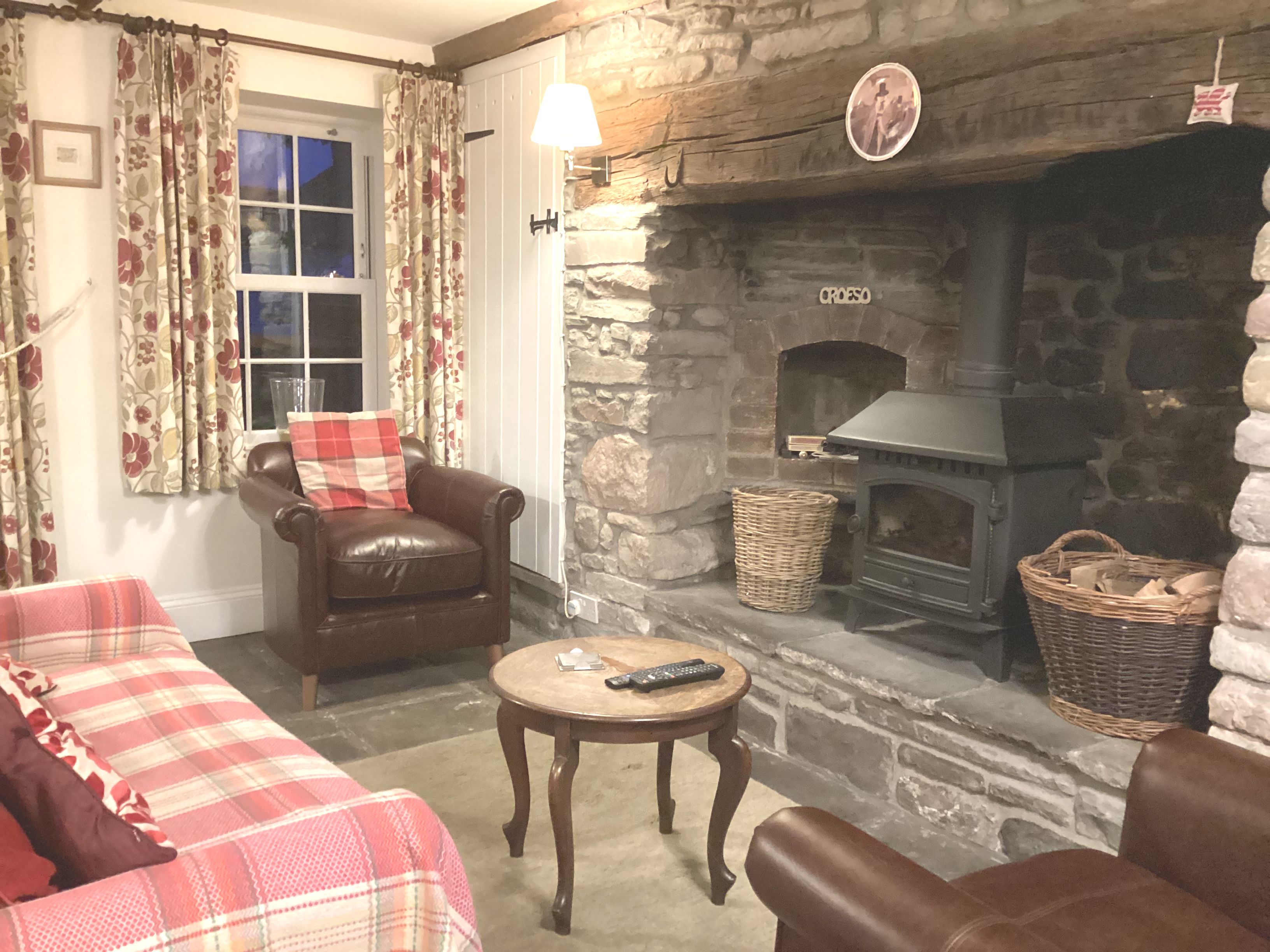 Cosy living room with inglenook and log burner