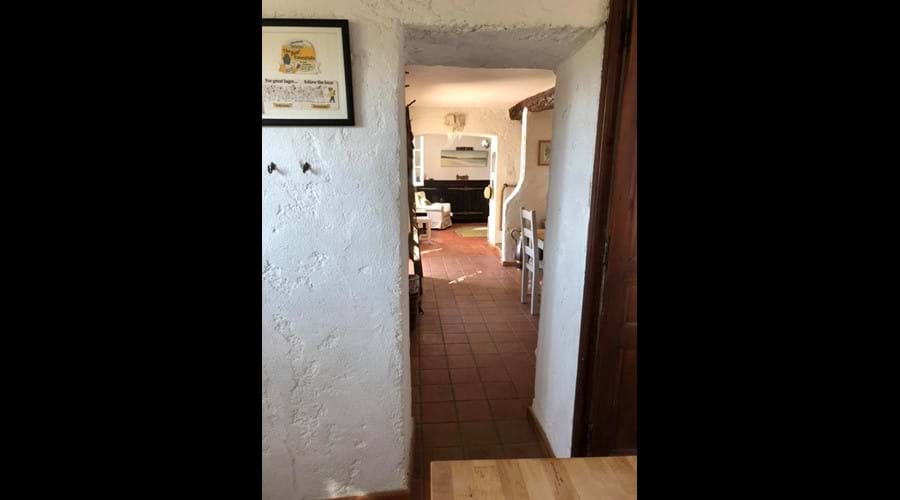 Looking through from the kitchen past the dining room to the sitting room in the house