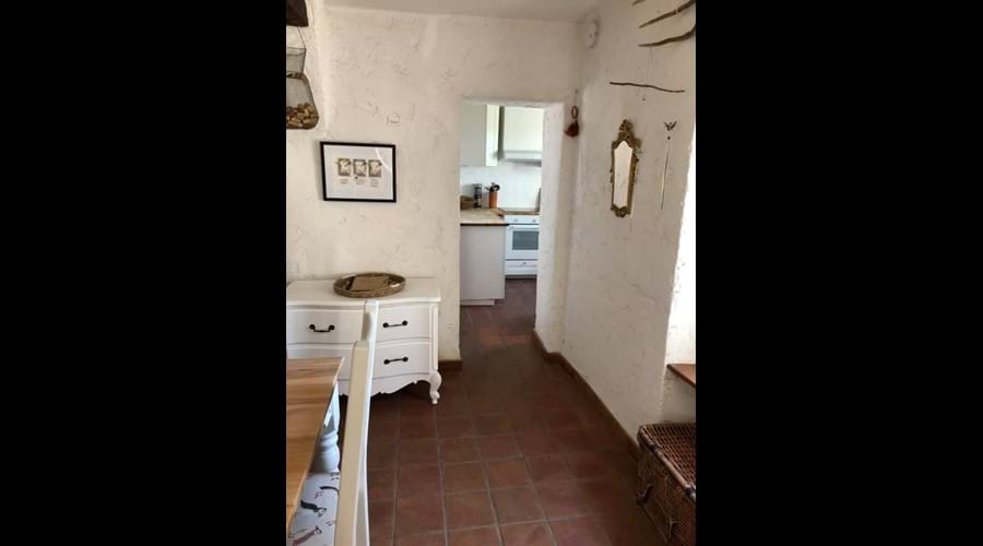 Looking through from the dining room to the kitchen in the house