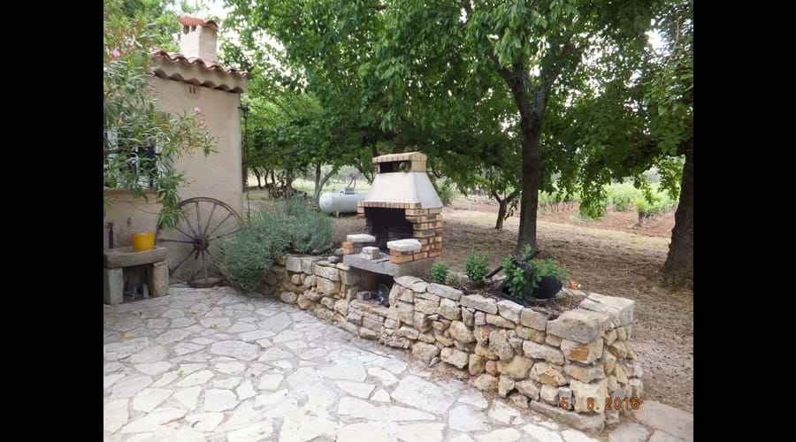 Outdoor BBQ (Not to be used in height of summer due to fire risk - we have a Weber gas BBQ for summer use)