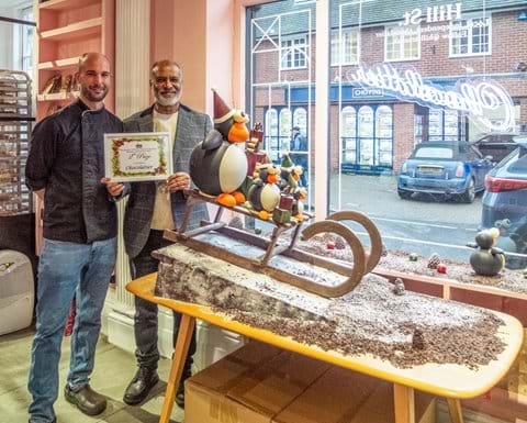 2024 Second Prize went to Chocolatier in Hill Street LtoR: Manager Chris Smith  and Deputy Mayor Jubeyuir Ahmed