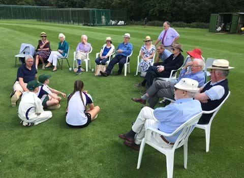 Initiative Members taliking with the Chairman of Saffron Walden Cricket Club, David Barrs, and three of the junior members on 22 June 2019