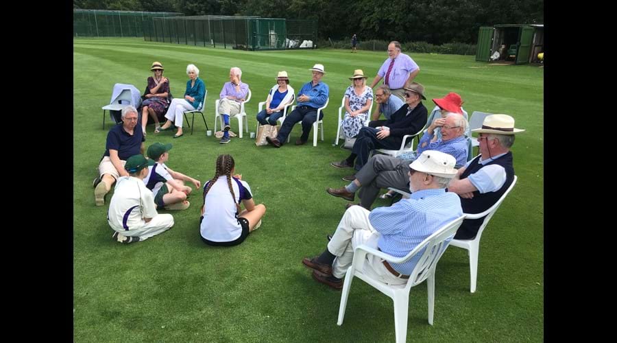 Initiative Members taliking with the Chairman of Saffron Walden Cricket Club, David Barrs, and three of the junior members on 22 June 2019