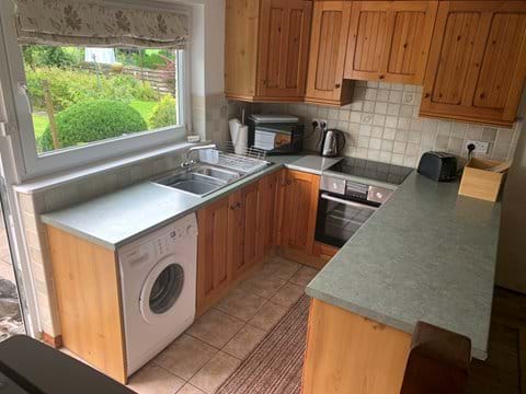 Modern well equipped kitchen with views of Keldas and Place Fell