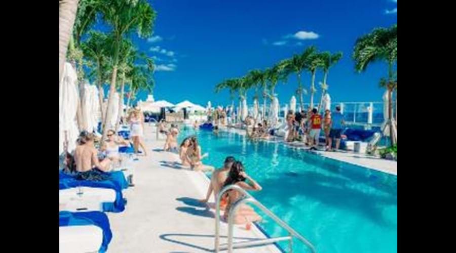 "Adult only rooftop pool with amazing food and drinks , our residence guests get priority seating"