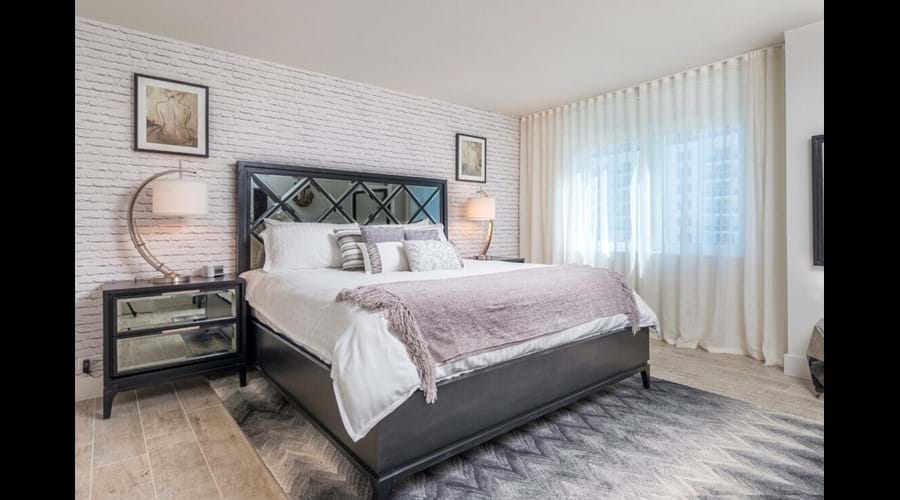 "Large bedroom with king Size sweet dreams bed with the finest linen"