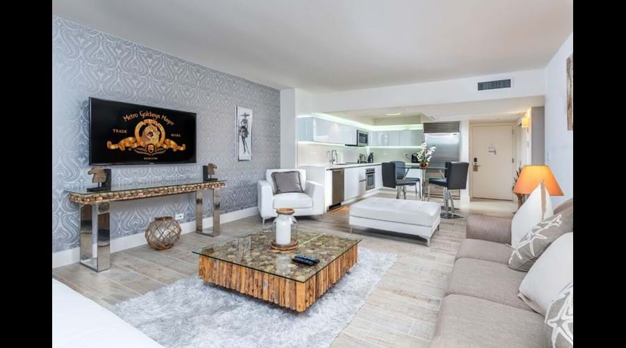 "Living towards the fully equipped kitchen a bright and spacious place to relax"
