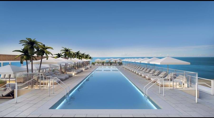"Amazing rooftop pool views of the ocean and city great bar food full service
