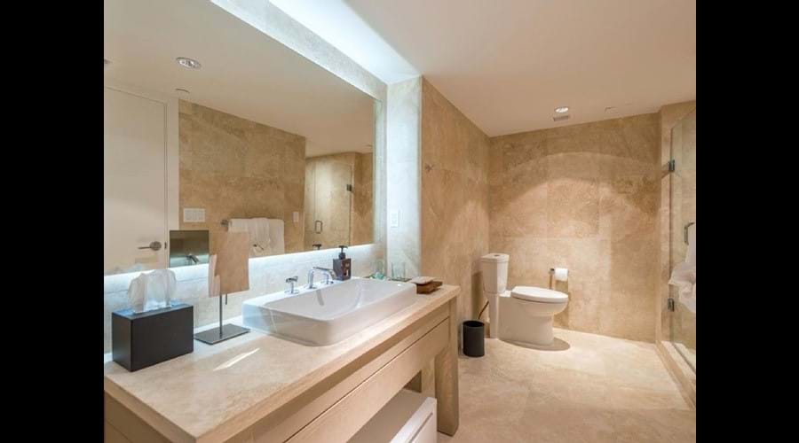 "Vanity unit with large illuminated mirror Brazilian porcelain flooring "