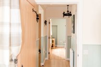 From the kitchen through to the hall, shower room and downstairs bedroom