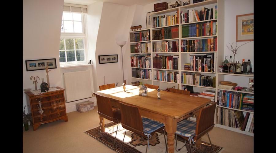 Antique pine dining table in living room