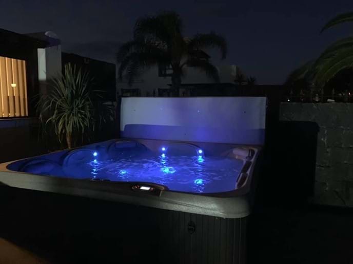 Hot tub at night - relaxing under the stars!