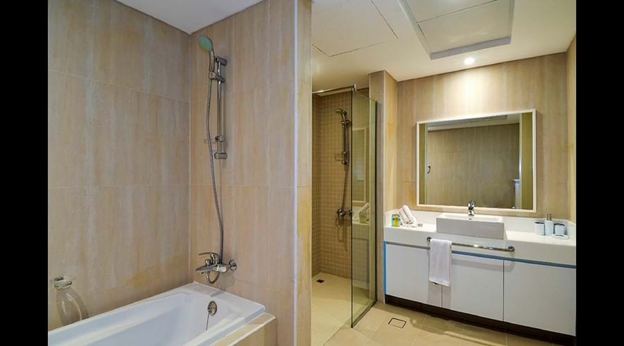 "Ensuite to main bedroom which includes a bath power showers,  large vanity unit
