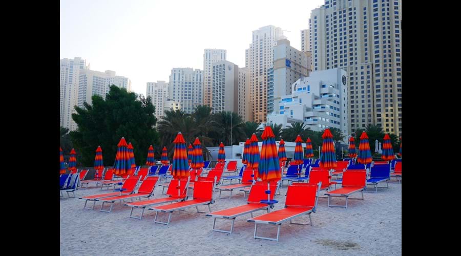 "Plenty of new sunbeds and umbrellas just for use by owners and guests private beach" 