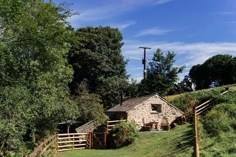 External rear view of Huckworthy self-catering holiday cottage in Devon