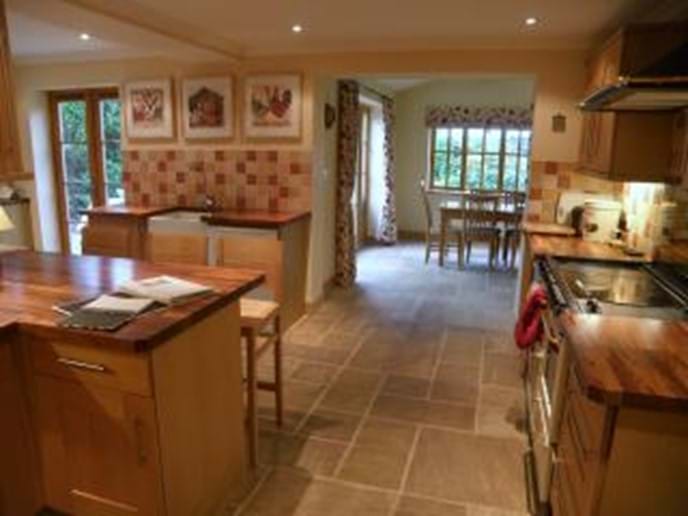 A large, fully equipped kitchen, with Aga 