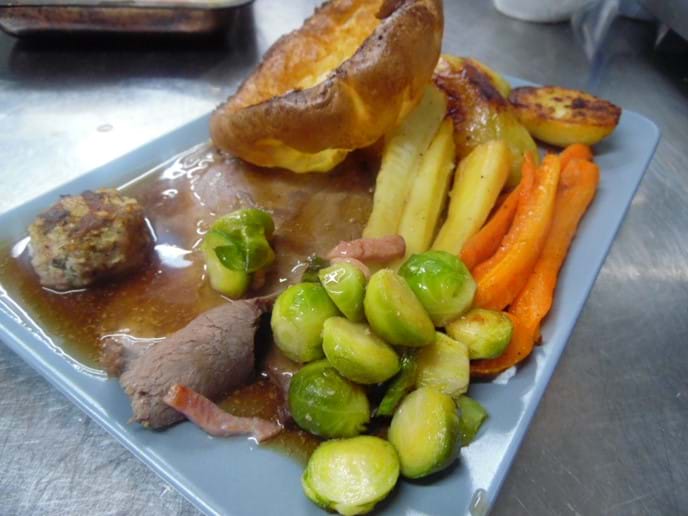 Roast Beef, Roasted Potatoes, Homemade Yorkshire Pudding, Roasted Parsnips, Roasted Carrots, Sprounts with Bacon & Walnuts and Homemade Gravy.