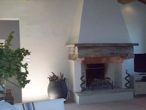The fireplace in the top sitting room