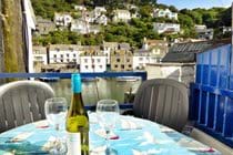 Watch the world go by with a cool glass of wine.