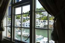 Sit in the Living Room window seat and watch the boats