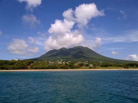 Nevis island from the ocean on a day sail